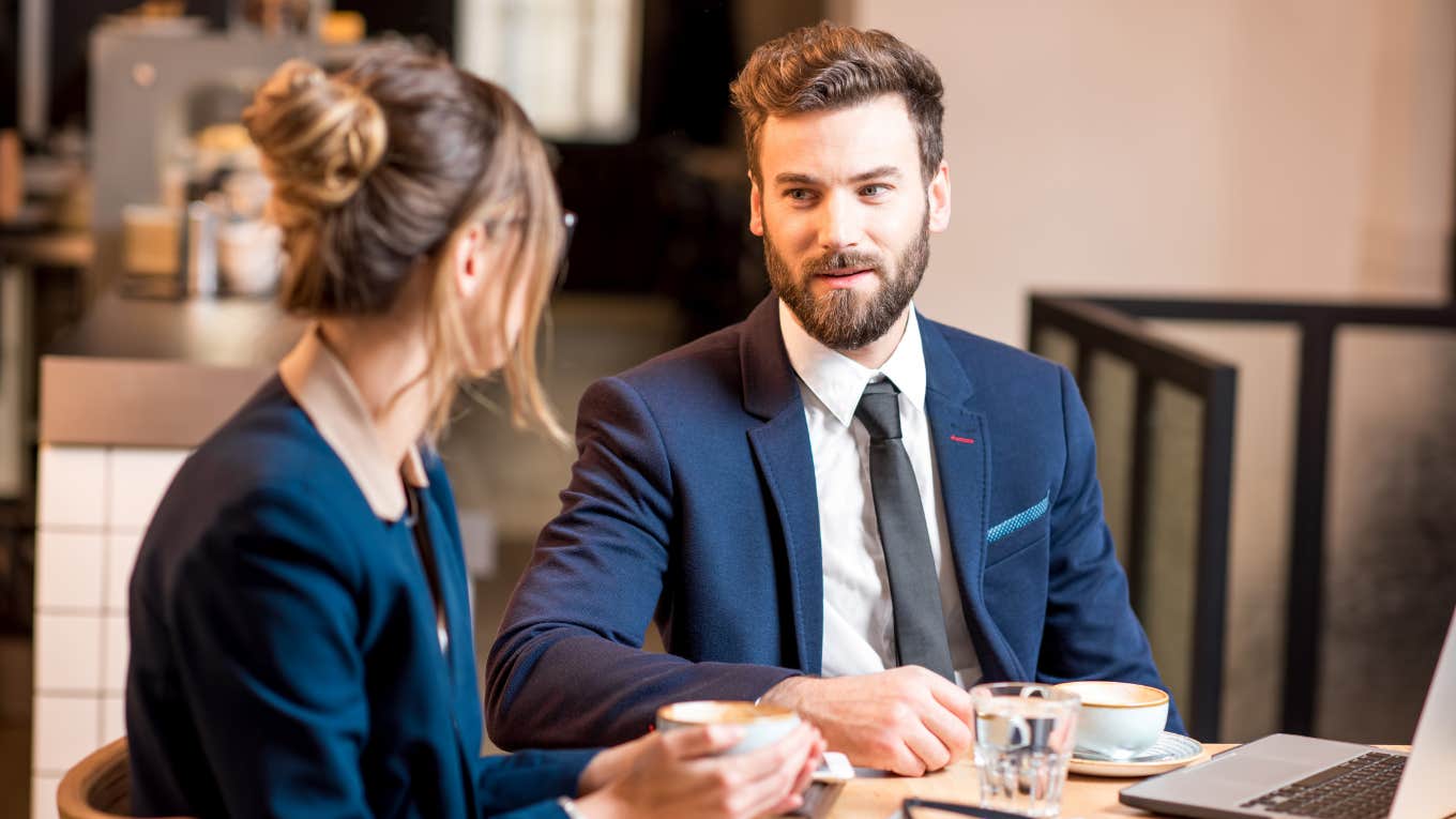 Man's Girlfriend Showed Up To Their Business Meeting Demanding To See His DMs man and woman having business meeting