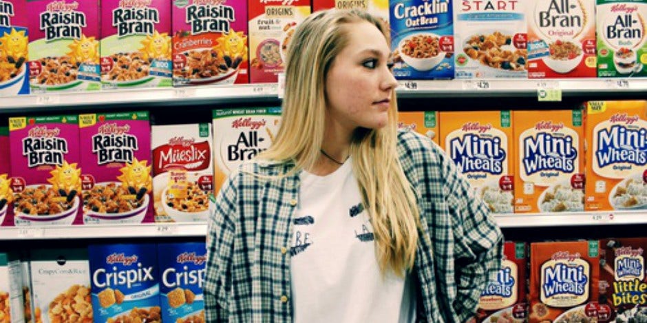girl in cereal aisle