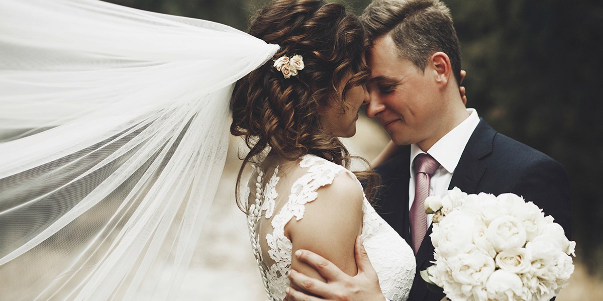 bride and groom embracing