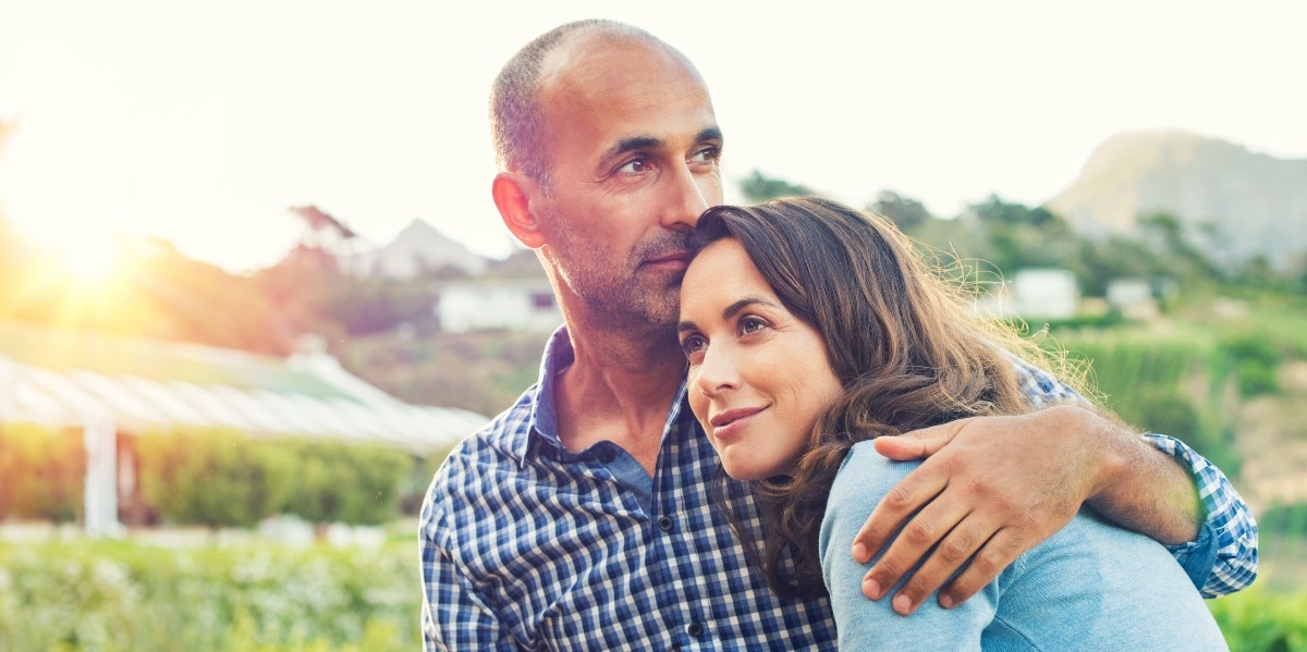 marriage retreat happy man and woman outdoors