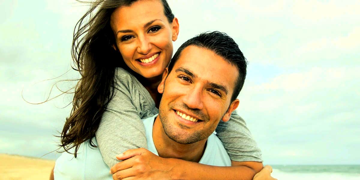 Golden Rules For A Happy Marriage happy couple smiling at the camera