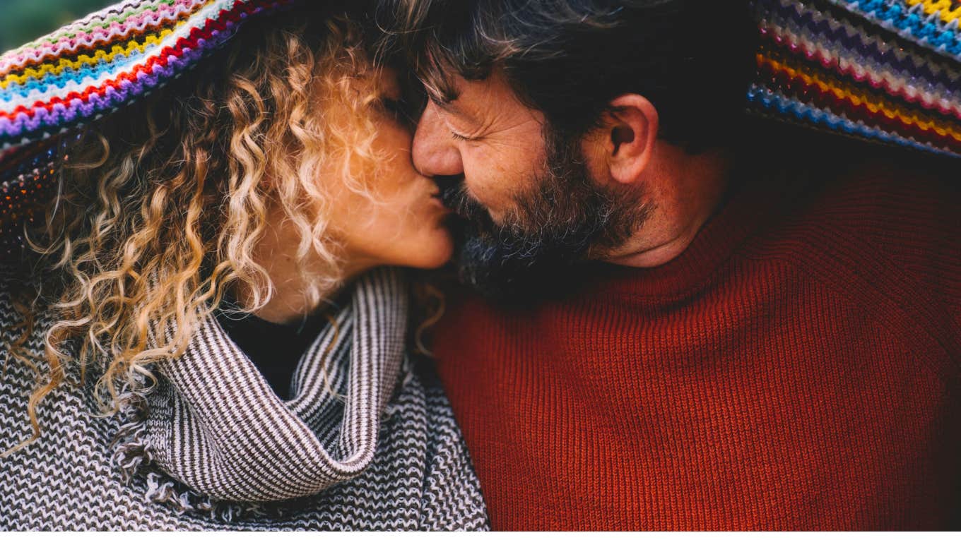 Uncomfortable Truths About Marriage That Are Often Misunderstood happy couple kissing