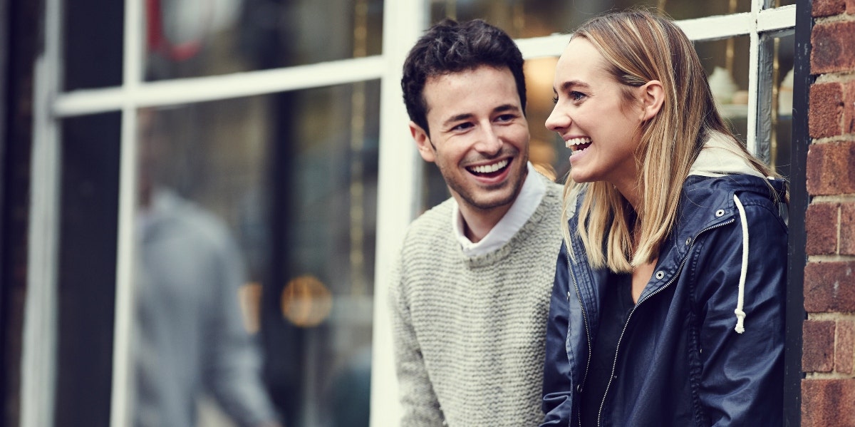 masculine energy in relationships couple laughing