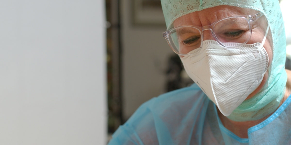 medical staff member wearing a mask