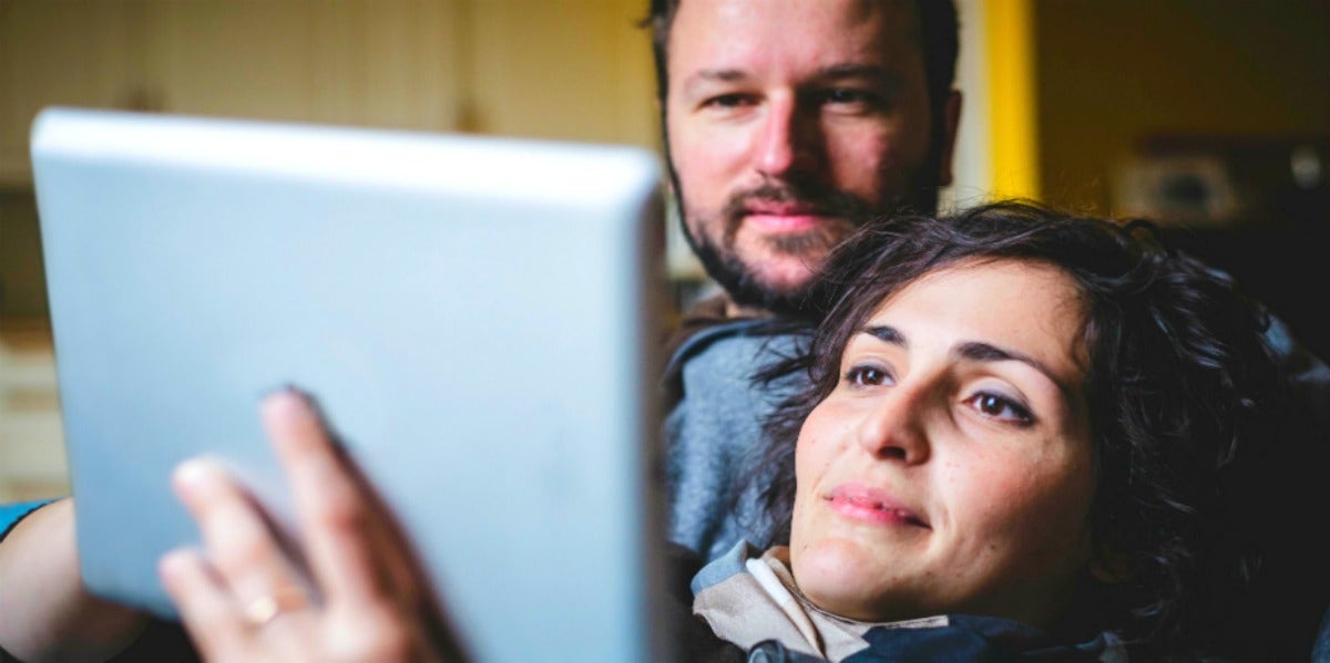 How To Meet Your Partner's Family Virtually couple on the computer