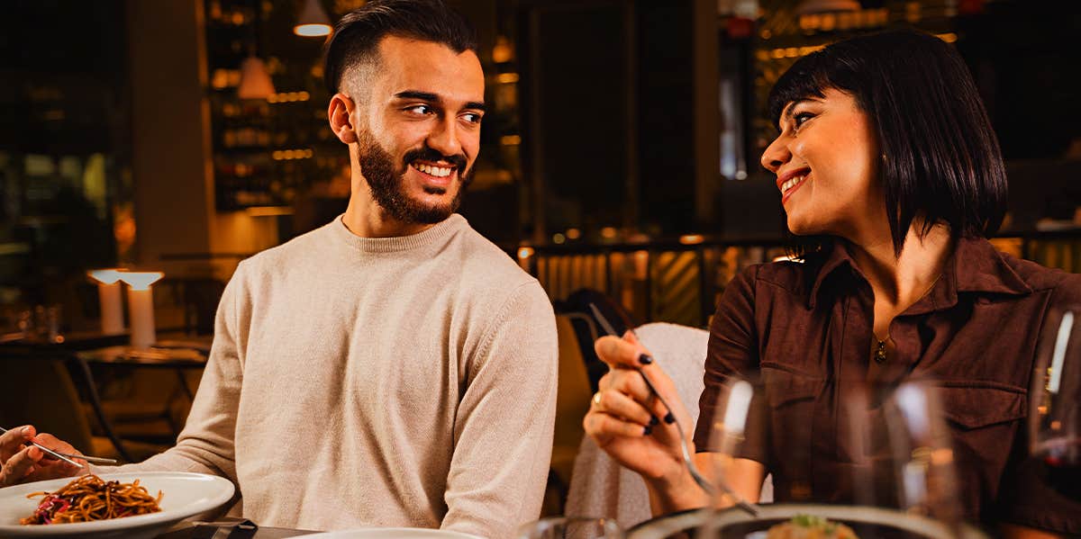 man and woman on dinner date