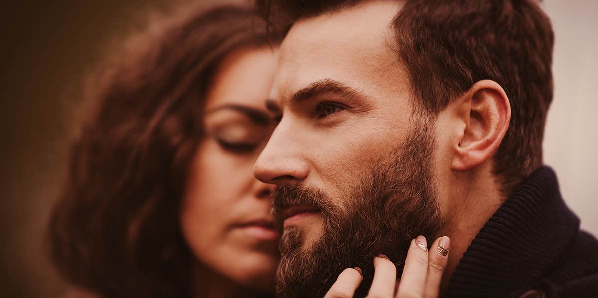 Why Men Who Have Beards Are More Likely To Cheat On You woman kissing a man