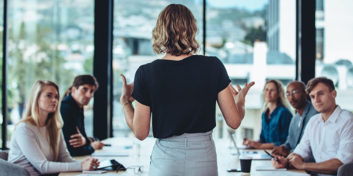 woman talking to co-workers