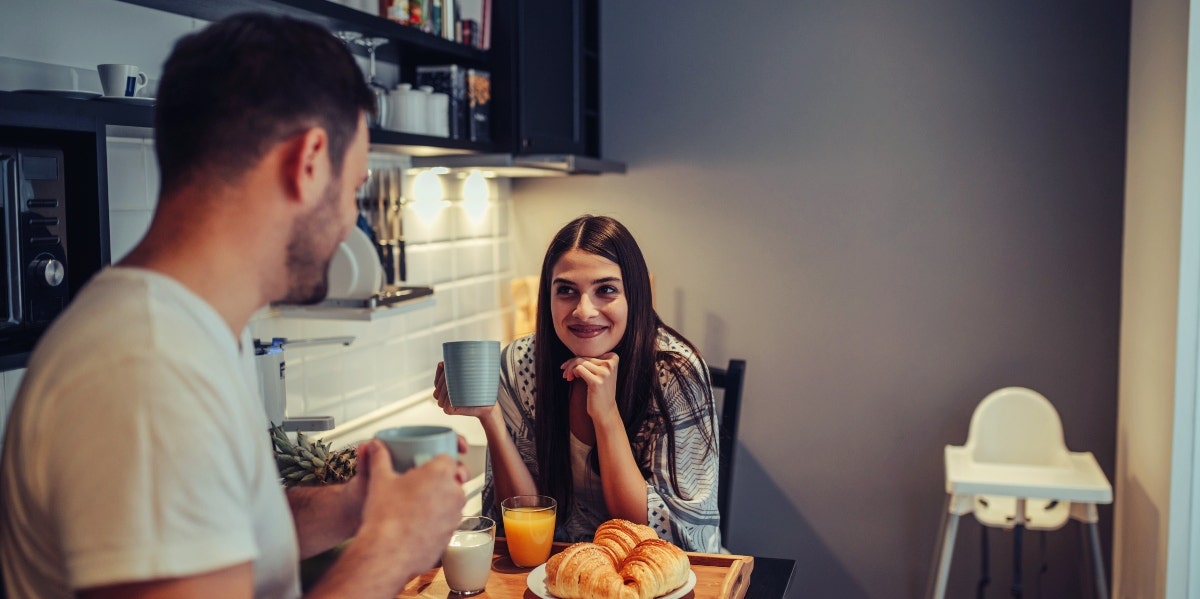 man and woman having coffee