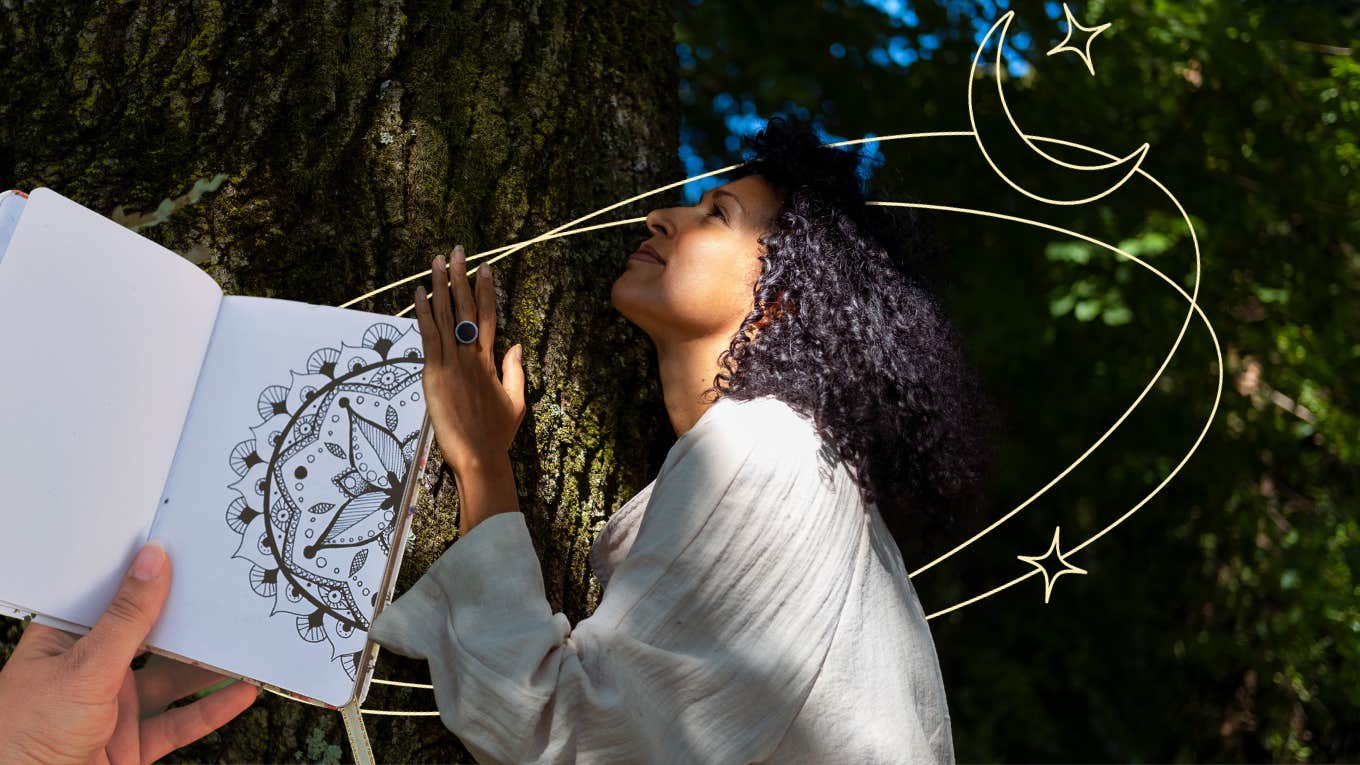 A woman touching a tree, journaling