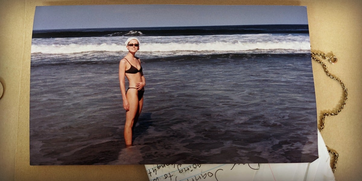 I Used To Be A Girl Who Wrote Poems That Boys Saved nostalgic collection of love letter, necklace and an old photograph of Joanna Schroeder in a swimsuit on a Florida beach