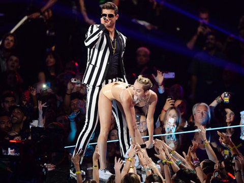 Robin Thicke grinding on a twerking Miley Cyrus at the 2013 MTV VMAs