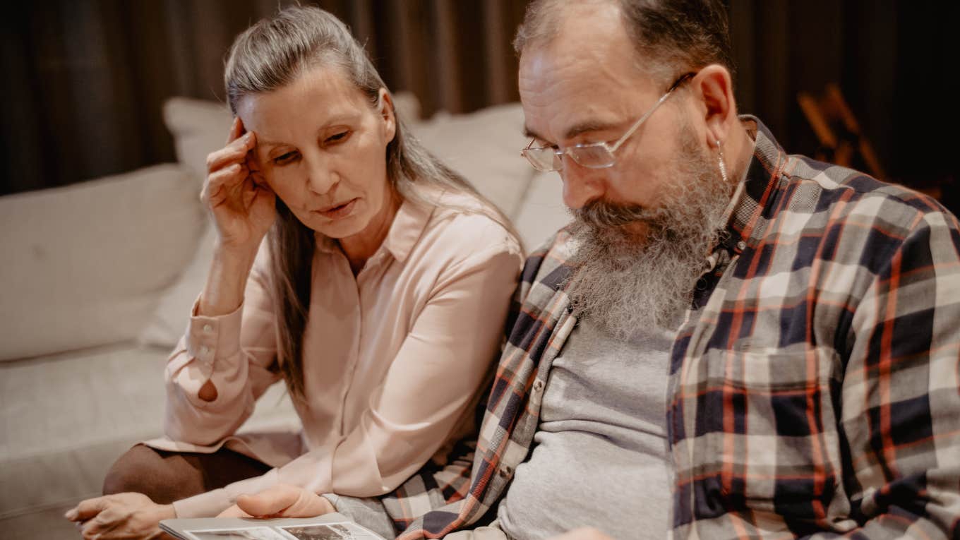 older man and older woman sitting together