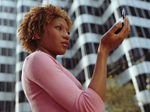 woman looking in miror