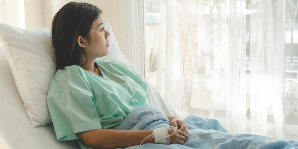 Woman in hospital bed