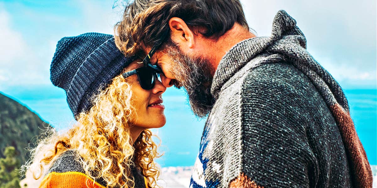 Why people choose mismatched partners Man and woman touch foreheads