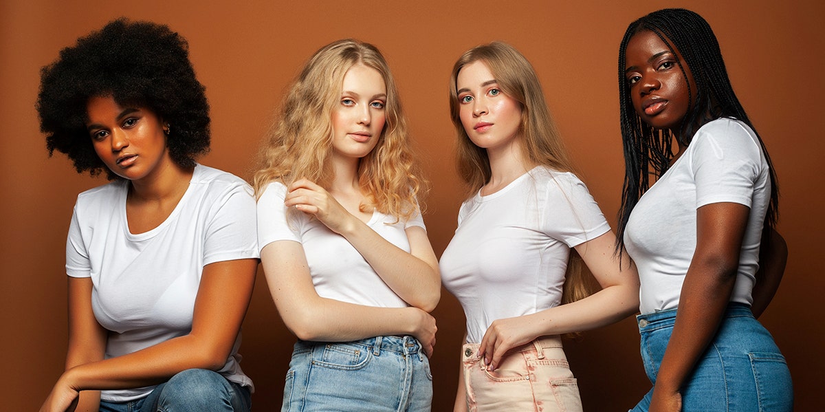 Group of young black and white women Group of young black and white women