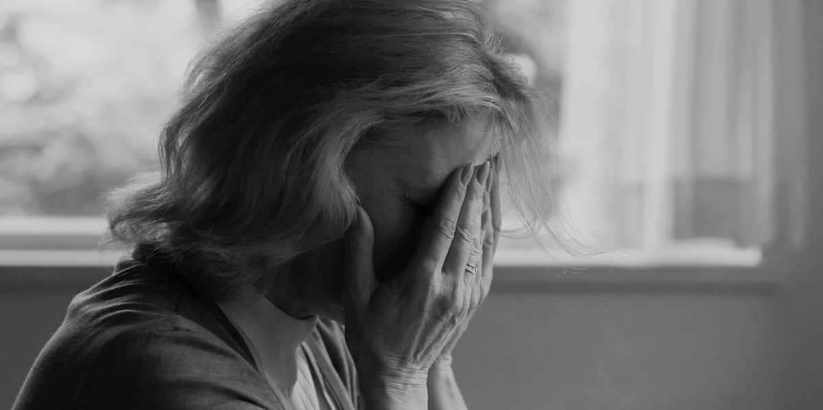 How I Coped After My Husband And Father Of Our 10 Kids Died From A Cerebral Aneurysm woman crying in grief
