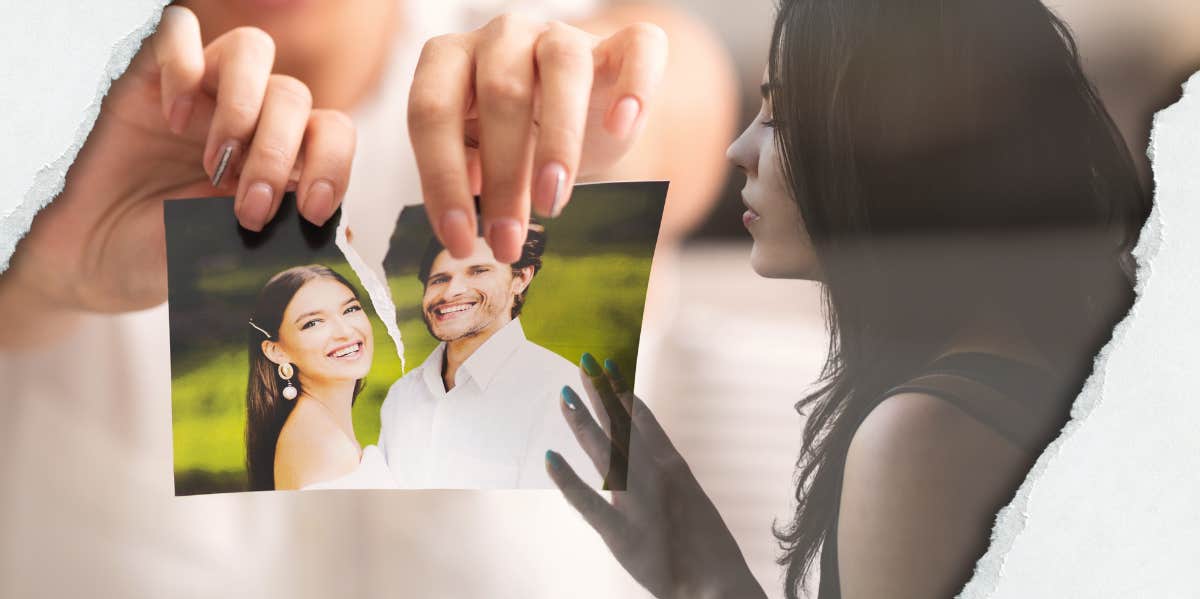 Woman tearing a picture of her and her ex