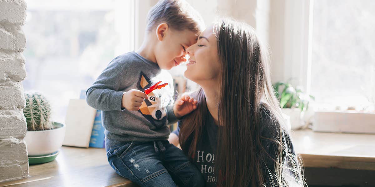 mom kissing son