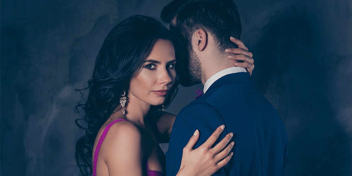 There's A Special Place In Hell For Mistresses Who Sleep With Married Men woman looking over her shoulder with her on a man's arm
