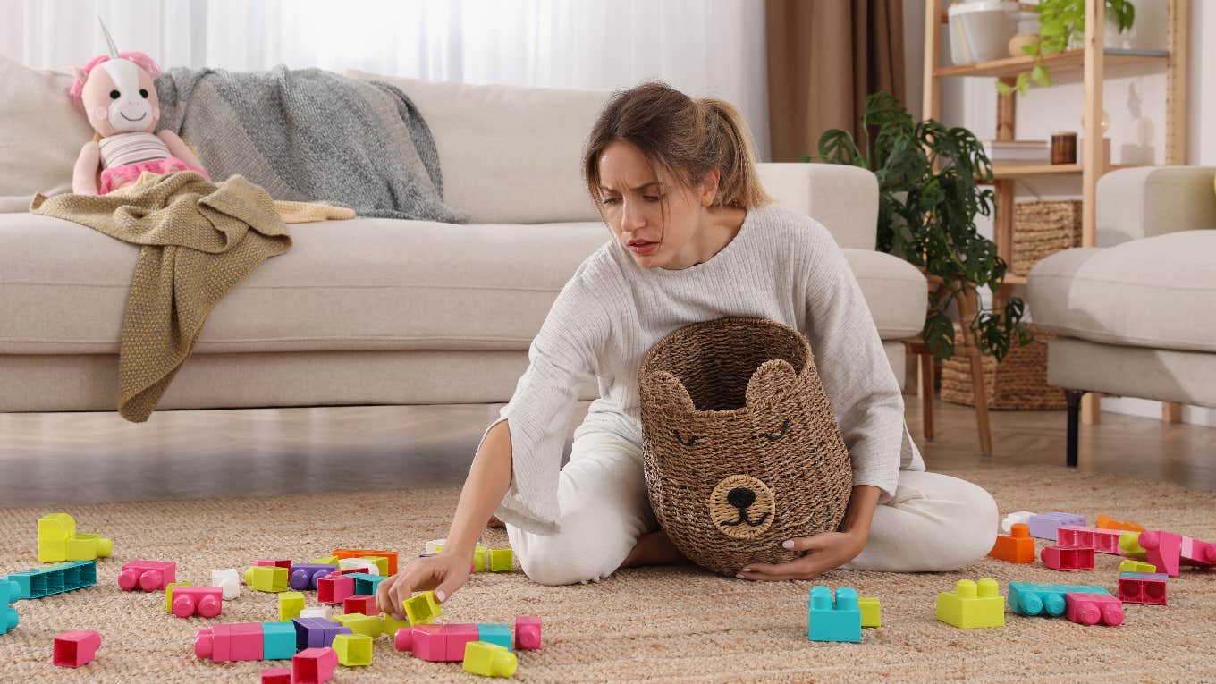 tired mom cleaning up after her daughter