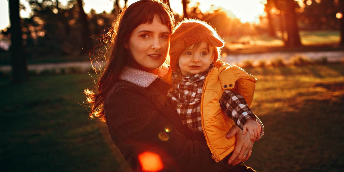 Mom and toddler in the sunset