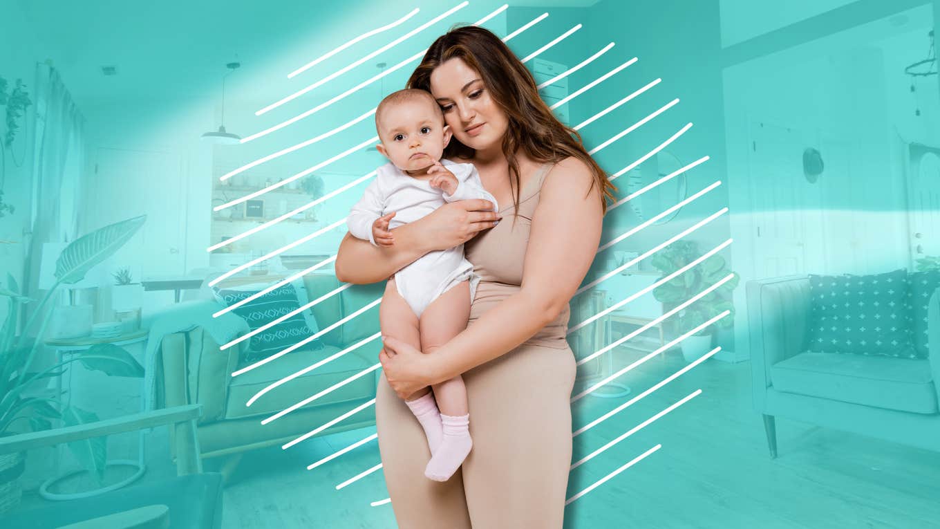 plus-size mom holding baby