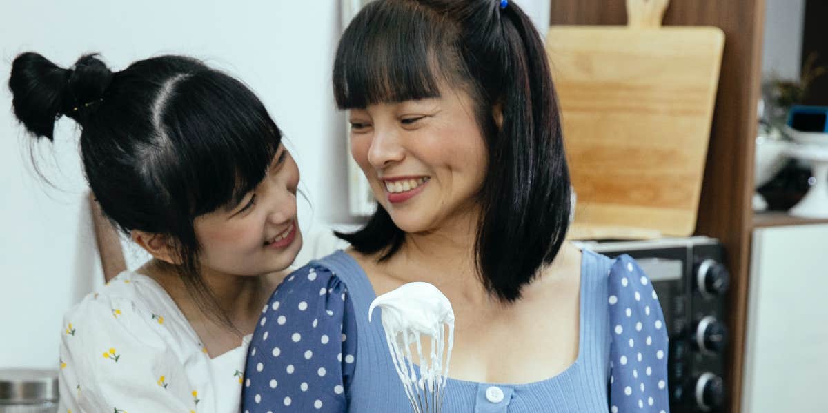 Mom and daughter baking