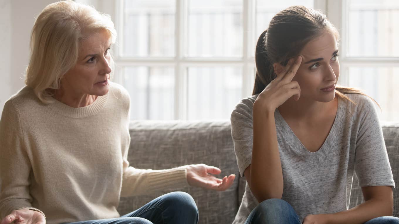 Mom Discovers Her Daughter Was ‘Having Fun’ Instead Of Going To Her College Classes annoyed mother and daughter sitting on couch having a fight