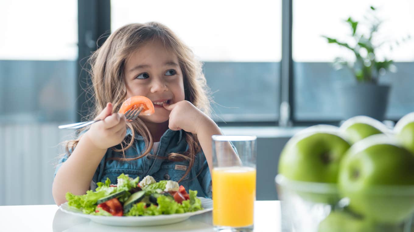 Mom Frees Up Time For Herself By Feeding Her Kids Dinner At 3PM little girl eating a salad
