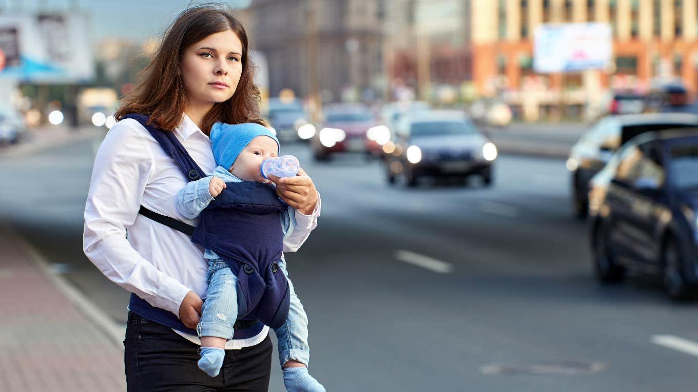 Husband Forces Wife's Sister To Live In Homeless Shelter And Lies About It woman outside with baby