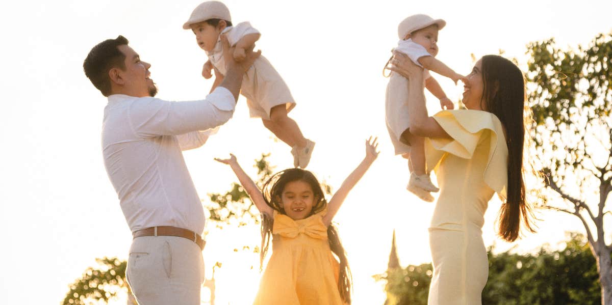 Mom and dad with three kids