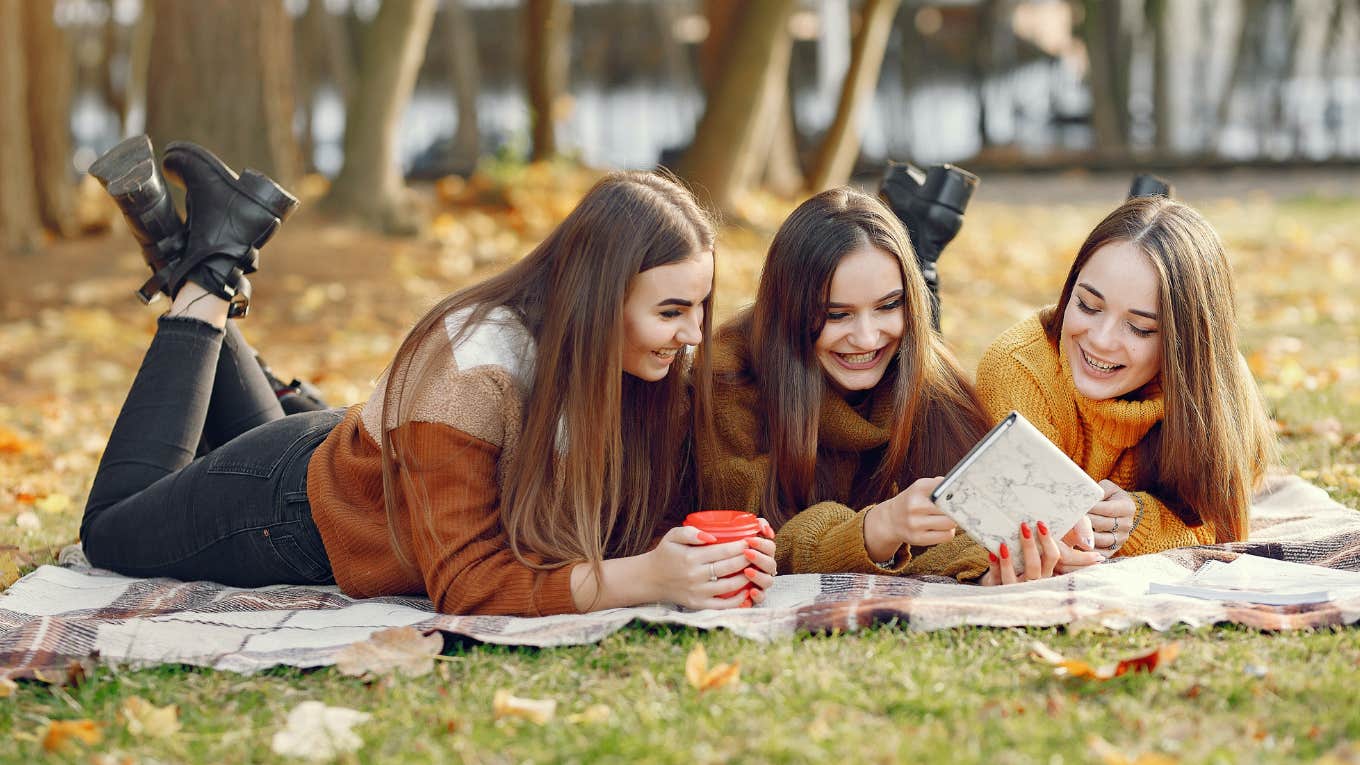 teen girls outside in fall