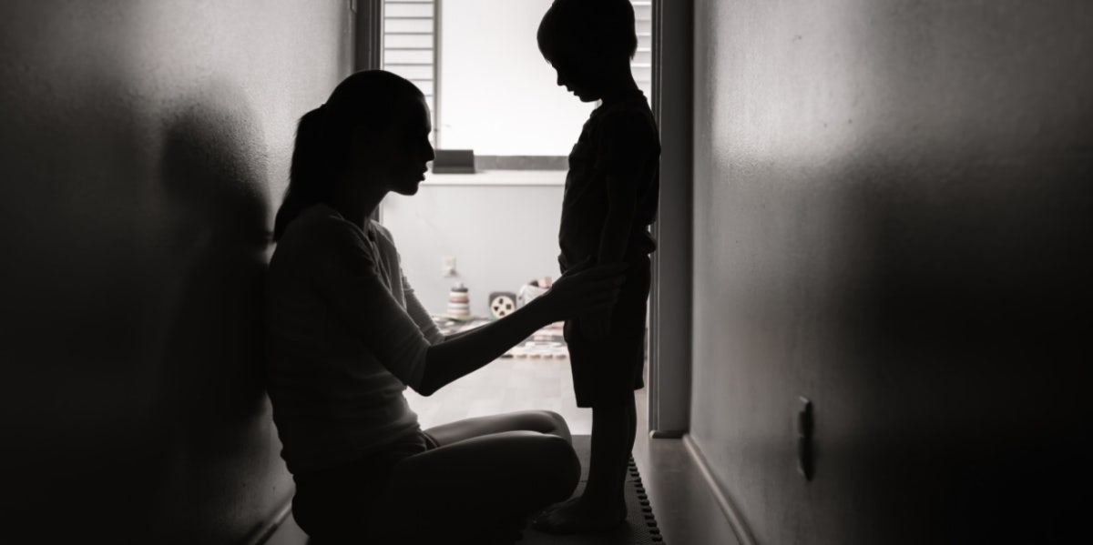 mom punishing child black and white