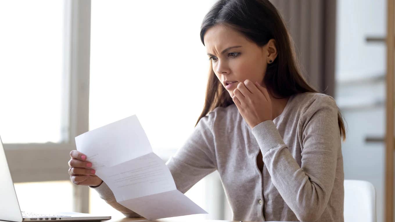 mom reading an intrusive school health questionnaire