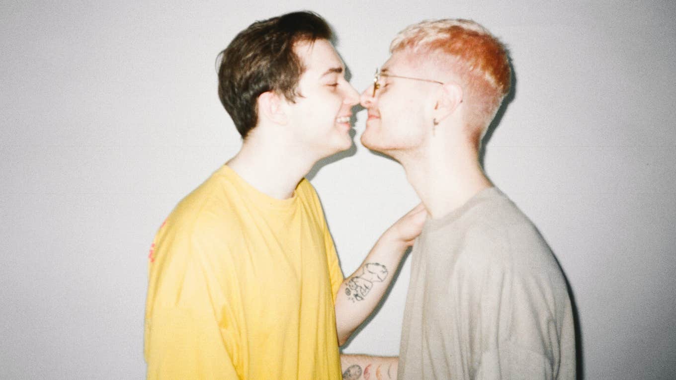 two boys kissing