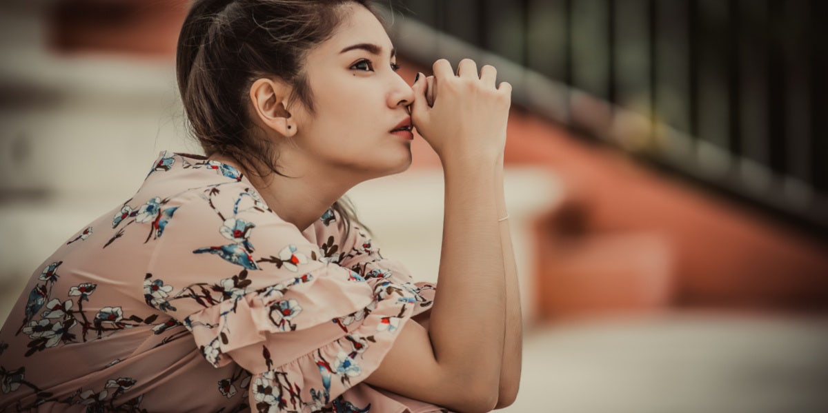 Why I Run Back To You In A Moment Of Weakness woman thinking floral dress