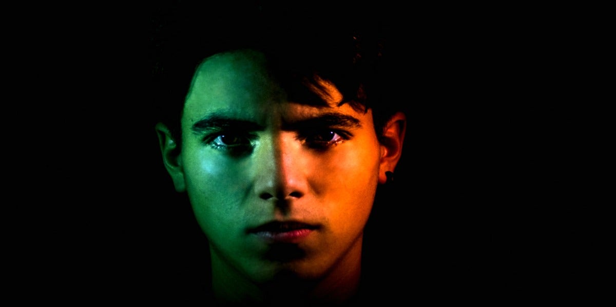 The Most Dangerous Zodiac Signs ‘Ranked By The FBI’ man with dark background