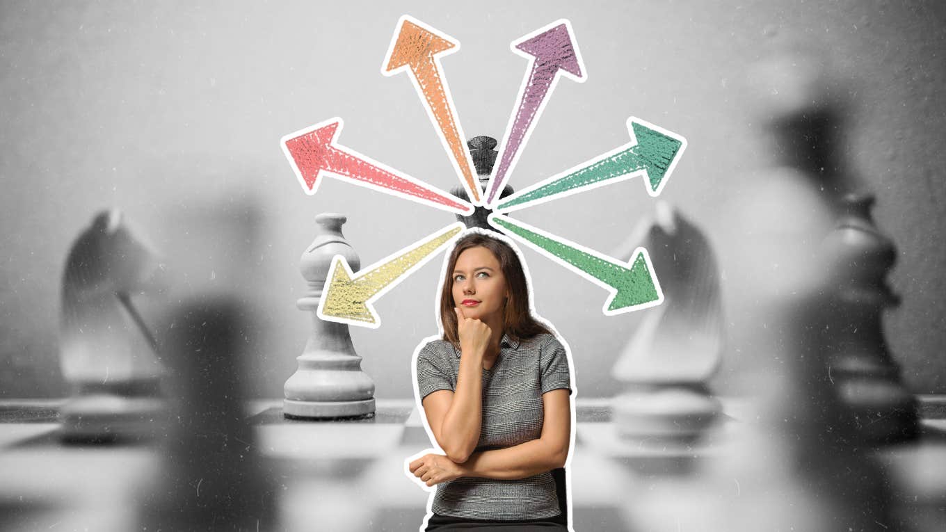 Woman making decisions about her life, chess board