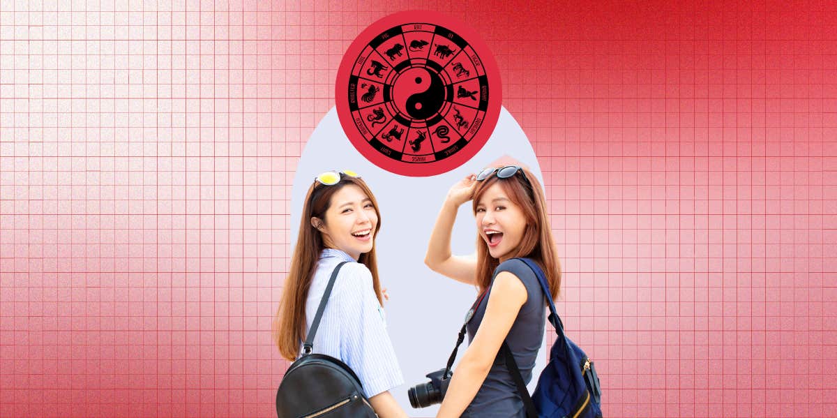 two Asian women and chinese zodiac wheel