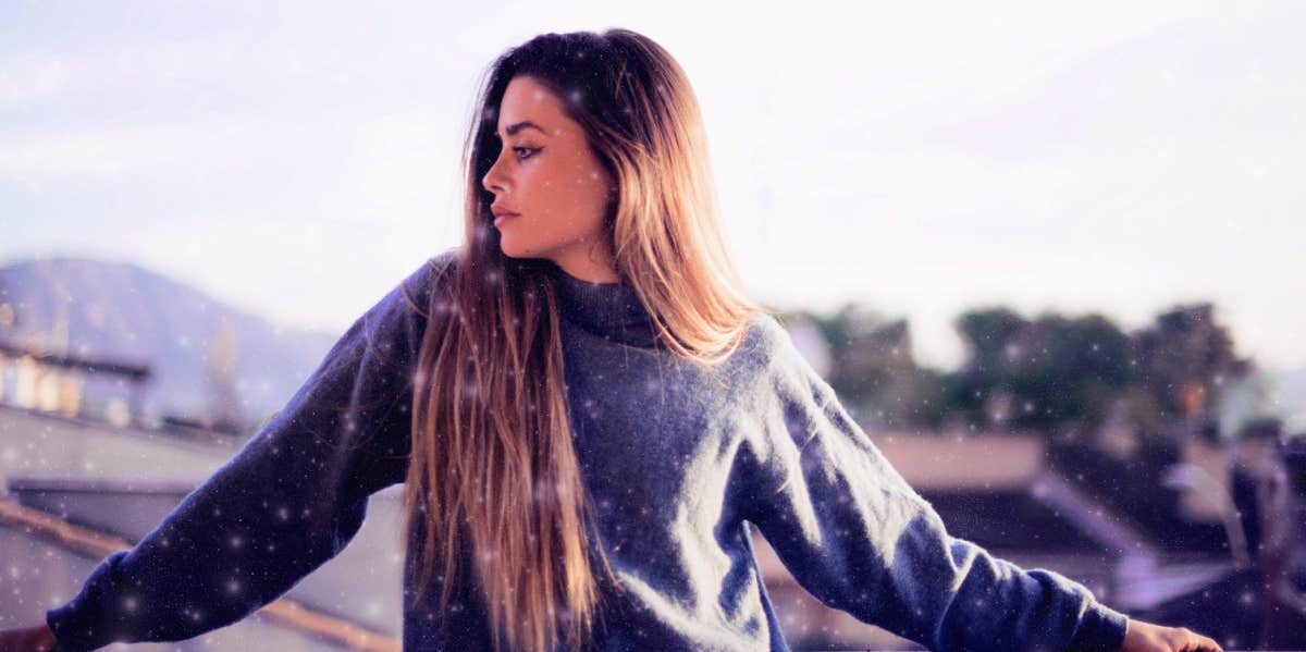 girl standing outside on balcony