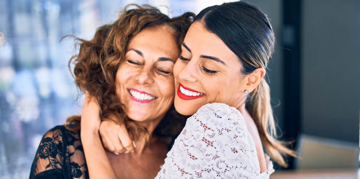 young woman hugging her mother