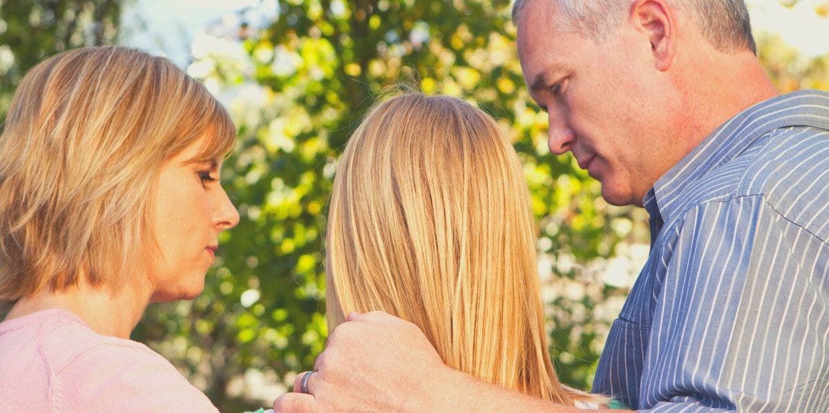 Mother, daughter and father 