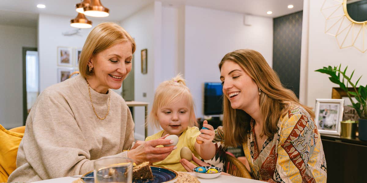 Mother-in-law with granddaughter and daughter-in-law