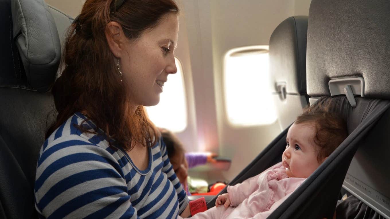 mother with baby on a plane