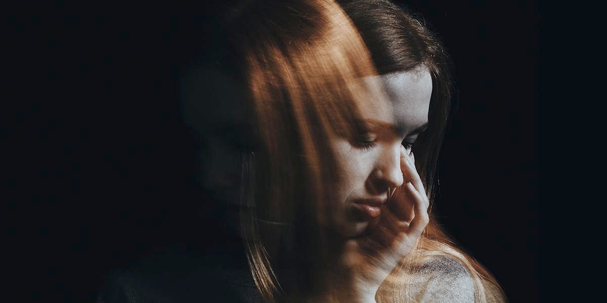 What It's Really Like Living With Multiple Personalities woman in shadow