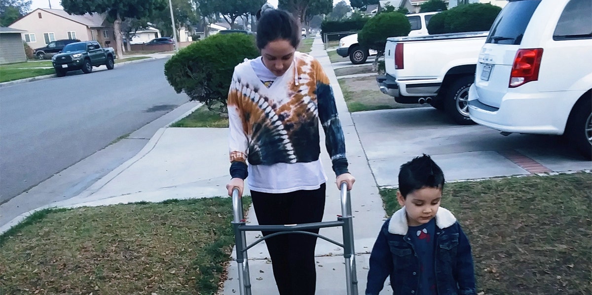 mother and son walking