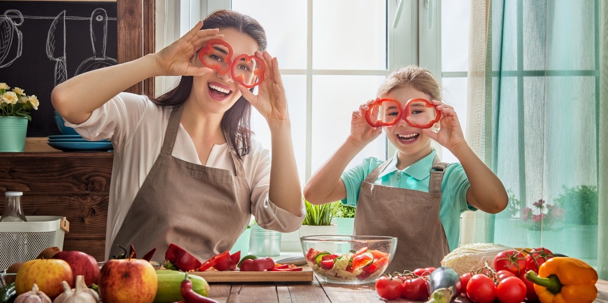 mother and daughter cooking together