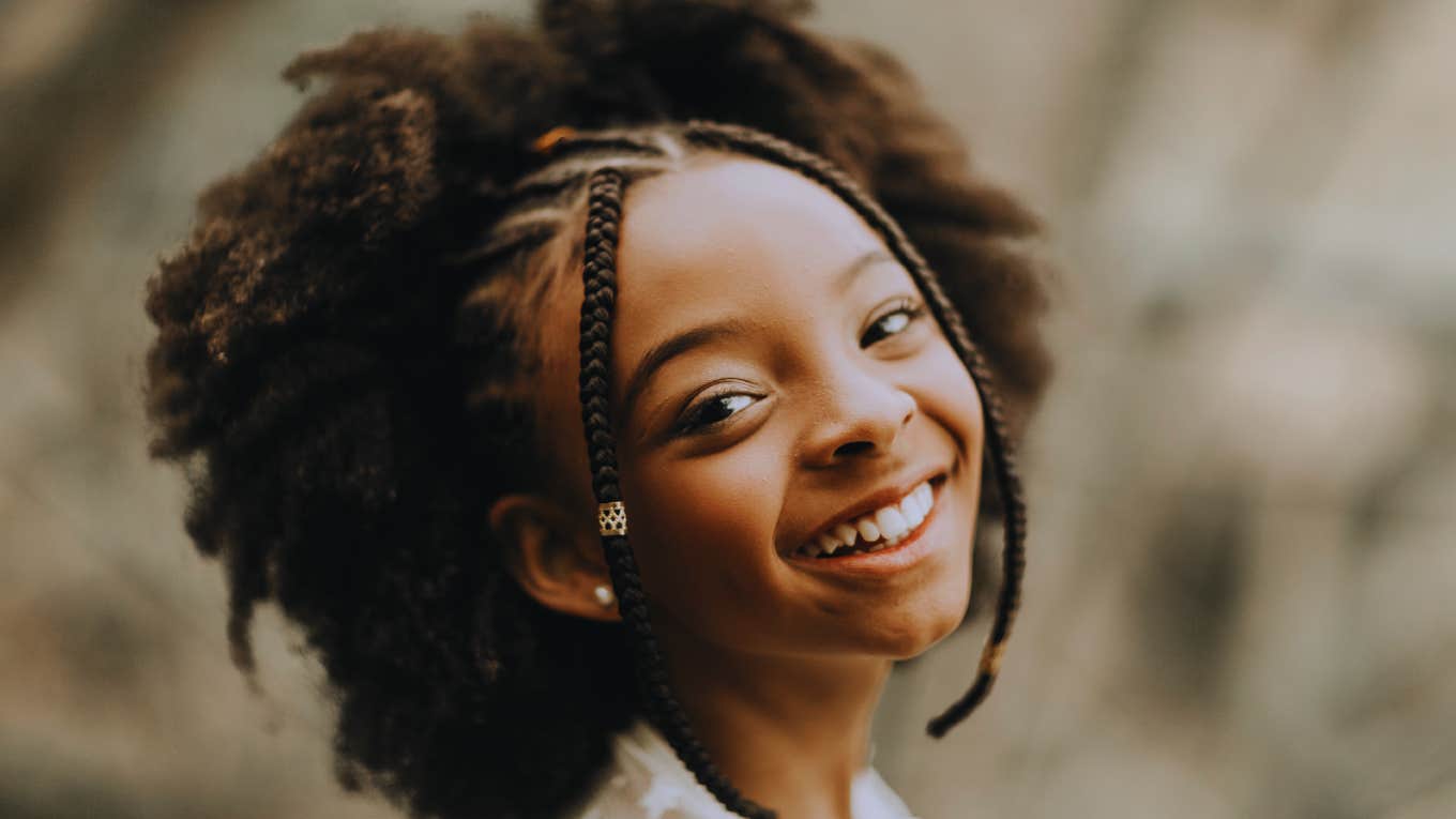 Young girl with curly hair